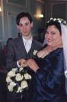 Couple with rings and bouquet